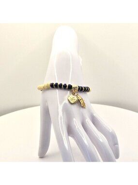 Beaded Stretch Bracelet With A Heart "Love" Pendant And Hamsa Hand Charm